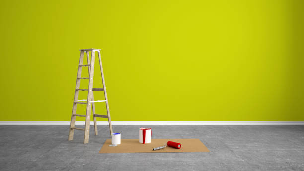 istock renovate living room with color wall and paint roller 1200312741