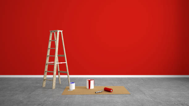 istock renovate living room with color wall and paint roller 1200312754