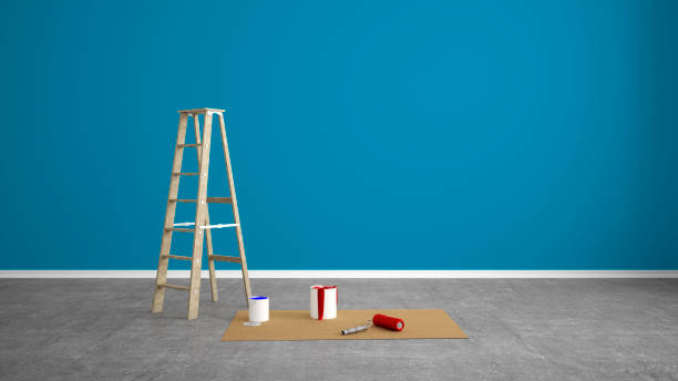 istock renovate living room with color wall and paint roller 1200312761