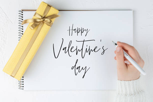 istock Happy Valentines day blank notebook among gift box 1200314179