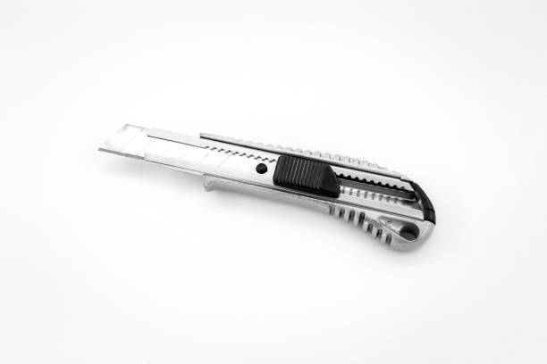 istock on the White, utility  knife used in cutting 1200314645