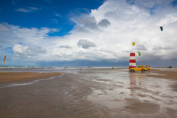 Wadden Sea National Park, Denmark - August 11,2018: Coastguard on the Lakolk beach after heavy rain. This beach is  beach after heavy rain, Jutland, Denmark. This beach is favorite for kiteboarding, surfing etc.