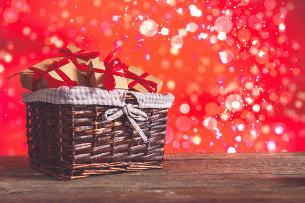 istock Valentines Day. Gift boxes set  zero waste. Gifts eco friendly craft paper boxes  red background, holiday concept, wedding invitation, greeting cards and mothers day. Long banner, March 8 Women's Day. 1200318632