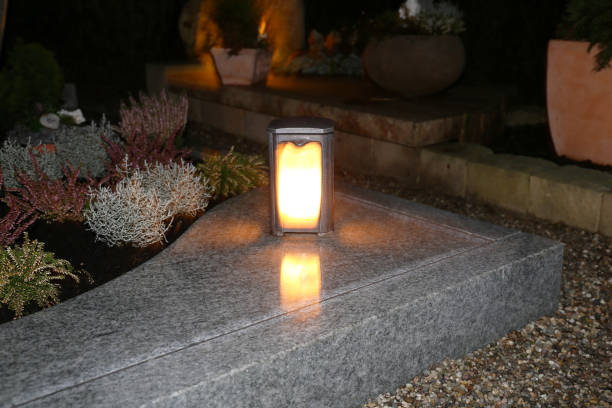 Lighting candles for the dead on All Saints Day