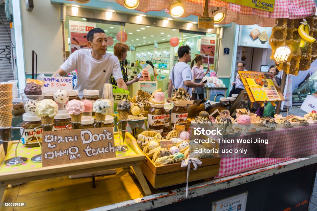 Tourist And Korean Walk In Myeongdong Street Food Market At Seoul South