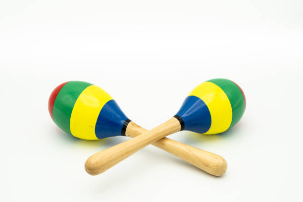istock a pair of colorful maracas lying on a white underground 1200320773