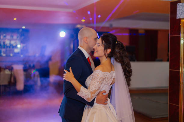 istock Happy newlyweds dance on the dance floor the first dance 1200321322