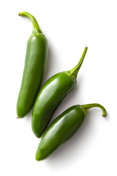 Vegetables: Jalapeno Peppers Isolated on White Background Vegetables: Jalapeno Peppers Isolated on White Background green chilli pepper stock pictures, royalty-free photos & images