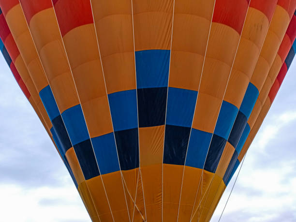 istock Multi colored Hot air balloons flying alone in Cappadocia, Turkey 1200324870