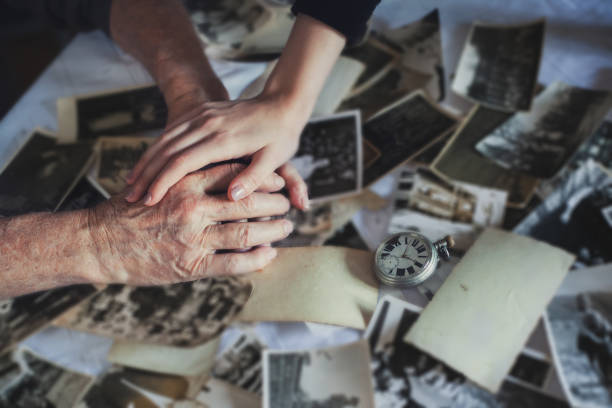 istock Holding hand -  grandson and grandfather 1200325870