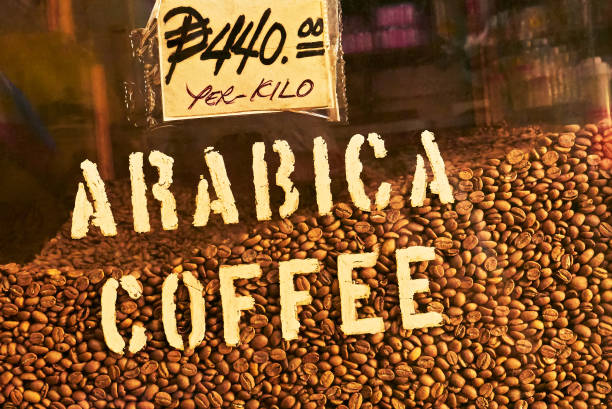 Roasted Arabica coffee beans for sale in a shop Roasted Arabica coffee beans for sale are displayed with price sign behind glass at a traditional store at Divisoria market in Manila, Philippines divisoria market stock pictures, royalty-free photos & images