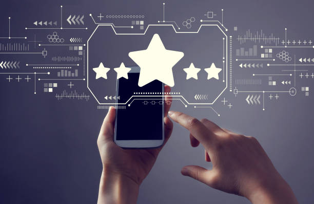 istock Five star rating with smartphone 1200327566