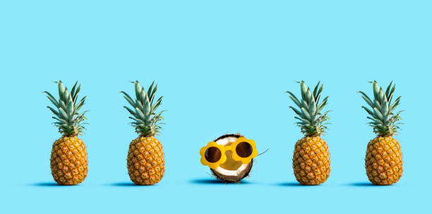 istock One out unique coconut with many pineapples 1200328378