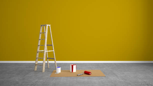 istock renovate living room with color wall and paint roller 1200328496