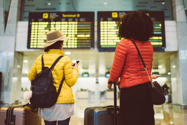 istock Friends at the airport 1200331246