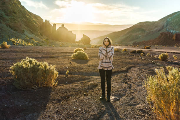 istock Woman walking in Atacama desert in Chile 1200334798
