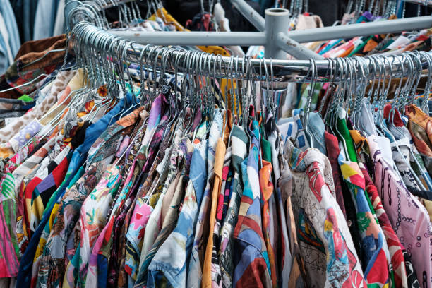 istock second hand clothes , vintage fashion on flea market 1200338565
