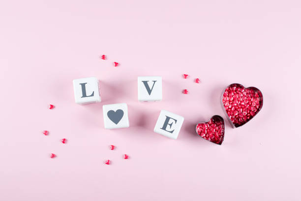 istock Heart Candy and Cubes Word Love. Valentine's Day Concept. Flat lay, top view, copy space 1200338612
