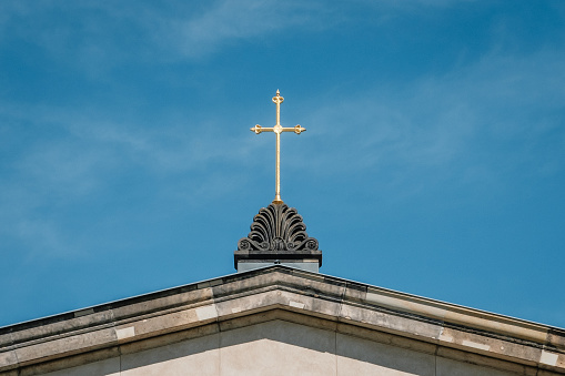 golden cross on church roof -  religion symbol - christianity