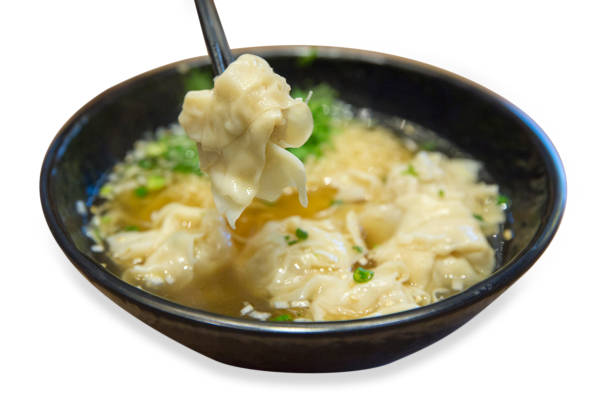 istock Shrimp Wonton Noodles on black bowl. 1200340097