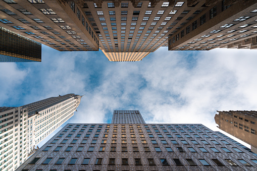 New York City midtown modern office skyscrapers buildings. Bottom view.