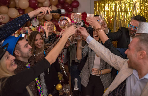 istock group of  people enjoying party 1200344058