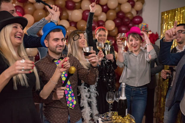 istock group of people enjoying party 1200344197
