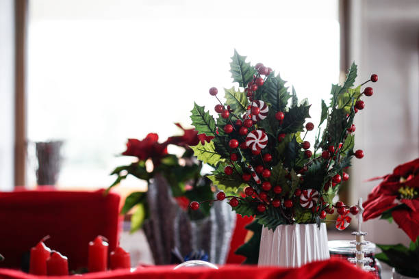 istock Close-Up Of Red Flower Vase On Table 1200345753