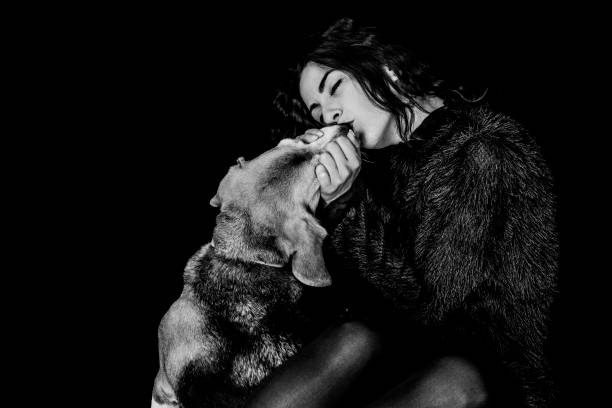 istock girl kissing her dog 1200346479