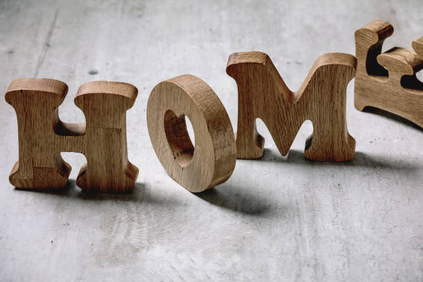 istock Wooden letters HOME 1200347422