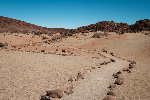walking path in desert landscape - walkway in rocky desert