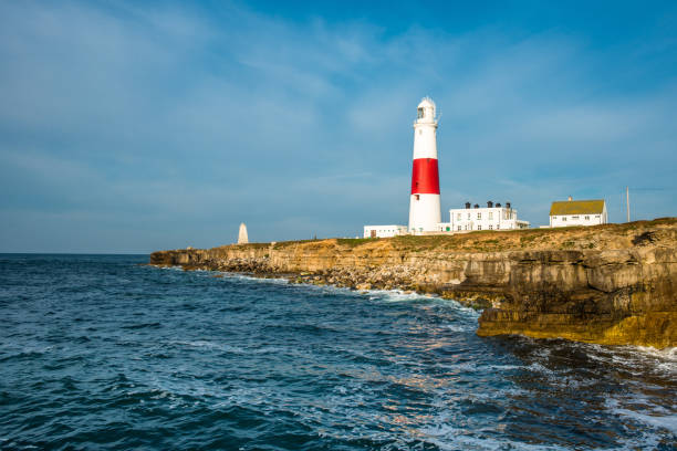 The lighthouse at Portland Bill The lighthouse at Portland Bill on the Isle of Portland near Weymouth on Dorset's Jurassic Coast. England. UK. bill of portland stock pictures, royalty-free photos & images