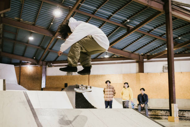 istock Skateboarder making stunts on a ramp 1200356745