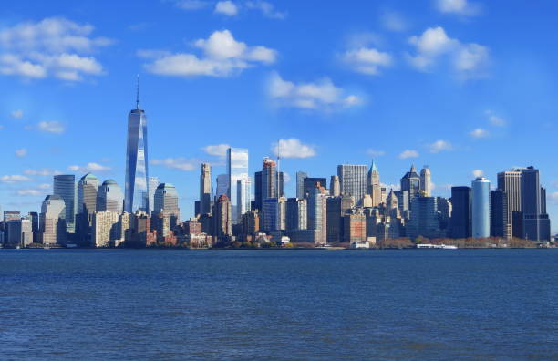 Manhattan Skyline Manhattan skyline and the Hudson River in the foreground, New York City, NY, USA lower manhattan stock pictures, royalty-free photos & images