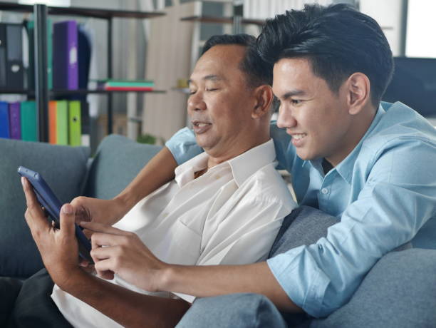 istock asian old father have installed good time with the son 1200360663
