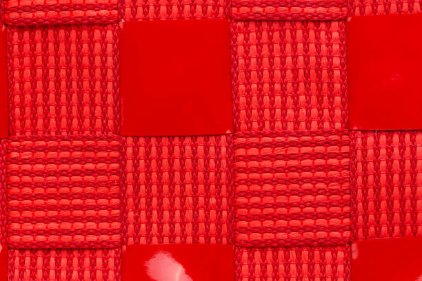 red wicker abstract background. Combined background of textile and patent leather. clearly visible background texture.