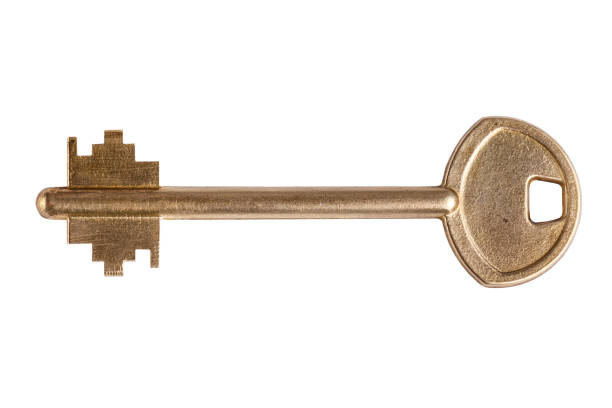 istock door key isolated on white background. clipping path. 1200362711