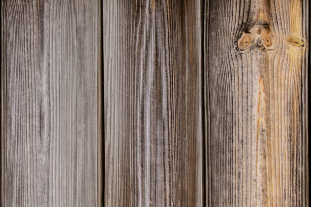 istock natural old wood texture grey striped yellow background 1200363777