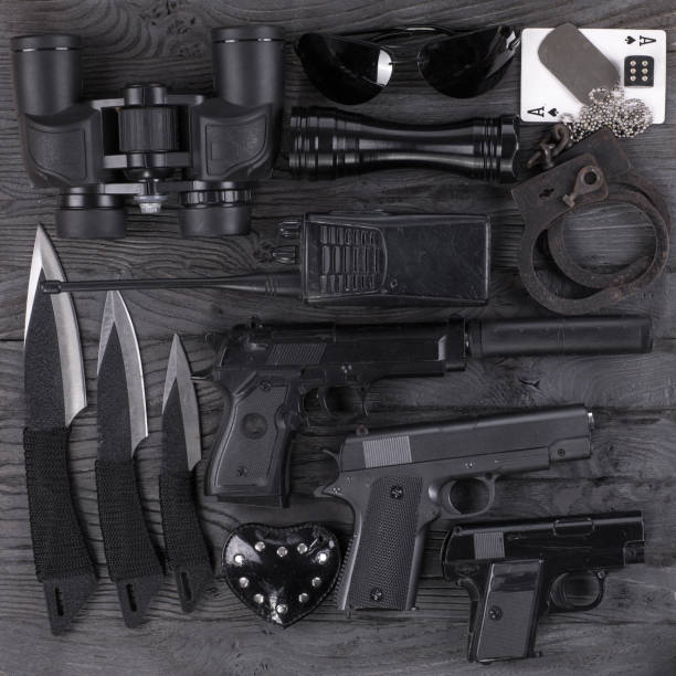 istock set of weapons, knives and pistols 1200365429