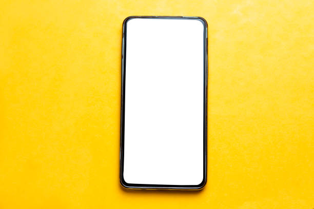istock Mobile smartphone isolated on yellow background 1200369166