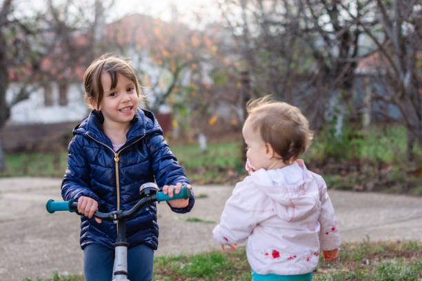 istock Kids playing in the yard. 1200369440