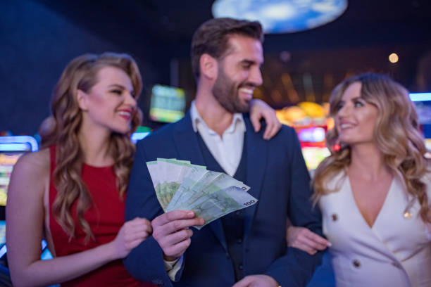 istock group of friends at casino 1200372876