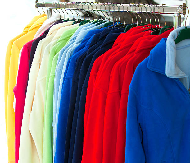 istock multicolor sport shirts hanging in store 120037344