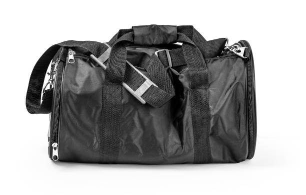 istock Black sport bag isolated. 1200379256