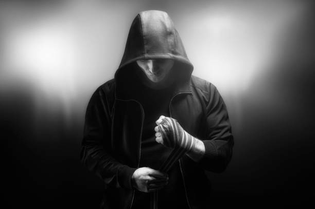 istock Young boxer preparing for fight, wrapping hands with bandage, copy space. 1200379815