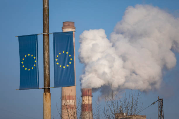 istock Smoking chimney and electric pole 1200381023
