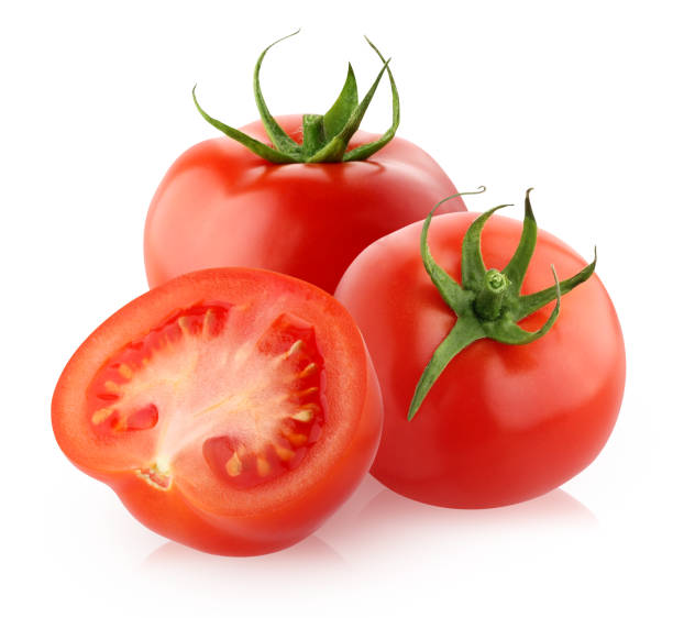 istock two whole red tomatoes and a half on a white background 1200383512