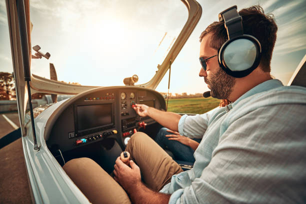 istock Serious man prepare take off on a sport airplane 1200383621