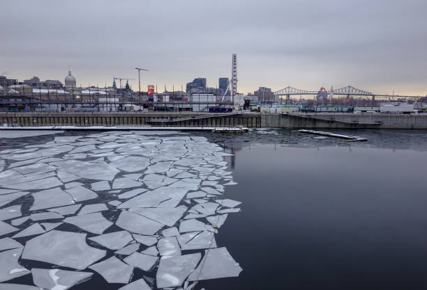 istock half formed ice sheet in front an urban area at golden hour 1200388005