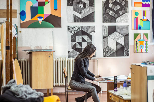 istock Businesswoman working in her art studio 1200389654